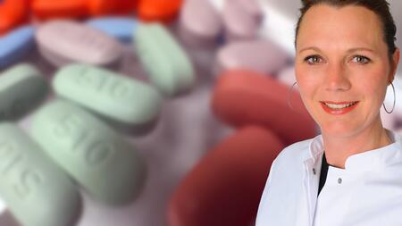In the background green and pink tablets, on the right in the foreground a portrait photo of Prof. Clara Lehmann.