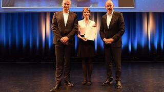Prof Marcus Altfeld (left), Dr Angelique Hölzemer (centre) with Prof Georg M. N. Behrens at the award ceremony in Salzburg