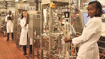 Modern production platforms for microbial agent candidates against malaria and other poverty-related infectious diseases